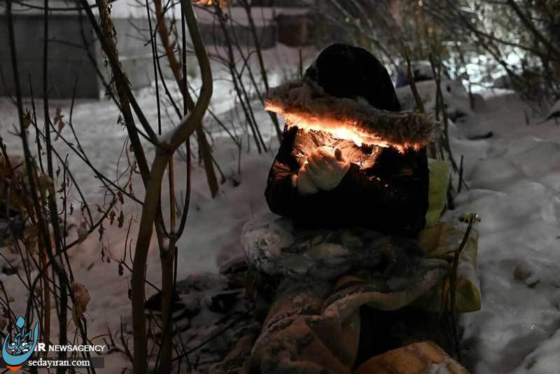 (تصاویر) زندگی بی‌خانمان‌های سیبری در سرمای منفی ۳۰ درجه