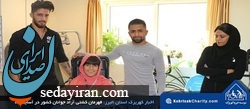 حیدریان مدال قهرمانی کشتی خود را به گردن یکی از معلولان کهریزک آویخت